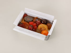 Boîte élégante de fruits confits Verlet: poires, cerises, kiwis, citrons, fraises et agrumes dans un écrin raffiné