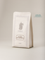 Paquet Verlet café Colombie Nariño San Antonio 250g, emballage blanc épuré avec cafetière ancienne et filet décoratif