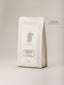 Paquet Supremo Pitalito Verlet, café Arabica de Colombie 250g, packaging blanc ivoire avec cafetière vintage